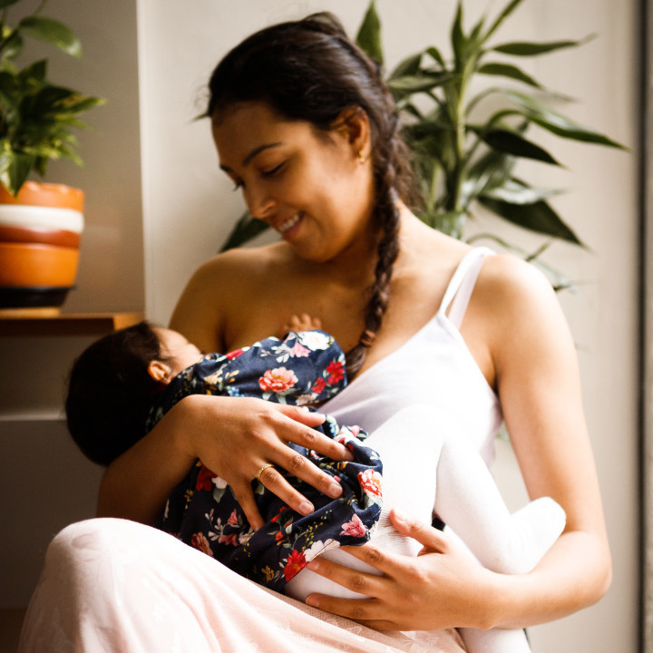mother in Ankeny breastfeeding with clogged duct